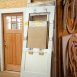 Custom three quarter view storm/screen door.